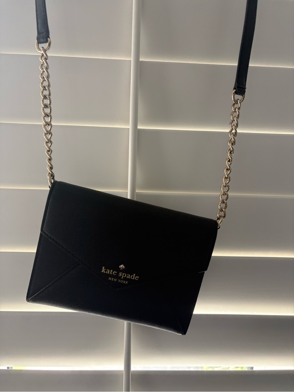 kate spade black envelope mini bag with gold accents